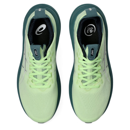 Light green Asics running shoes with a dark green sole on a white background