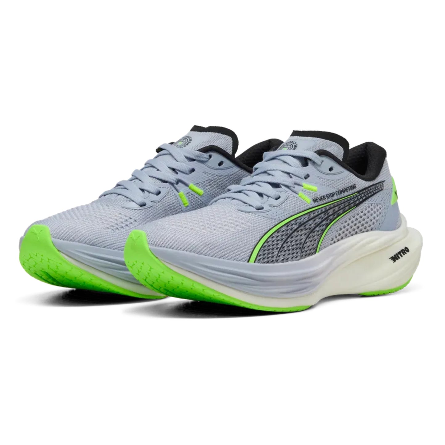 Gray Puma running shoes with green accents on a white background