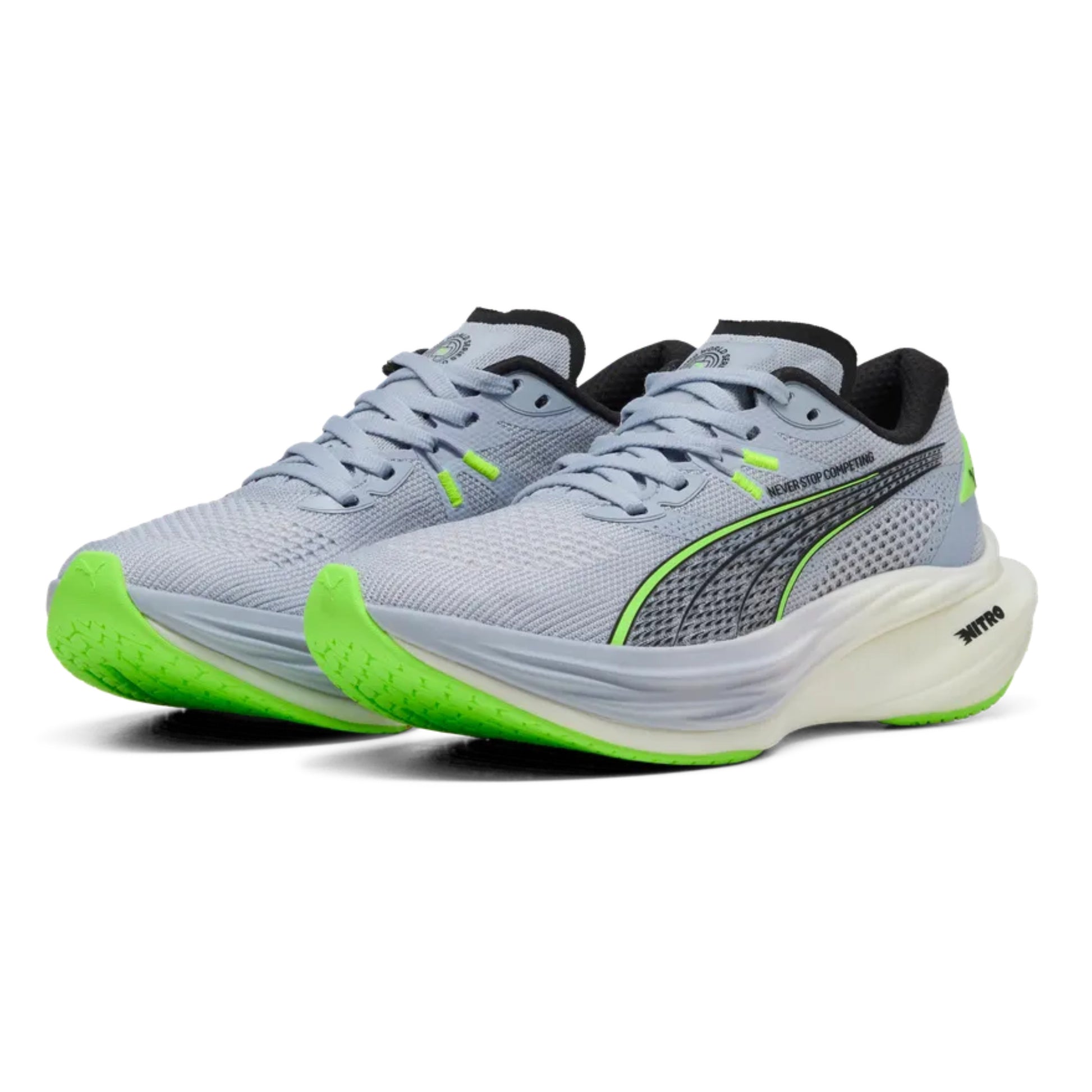 Gray Puma running shoes with green accents on a white background