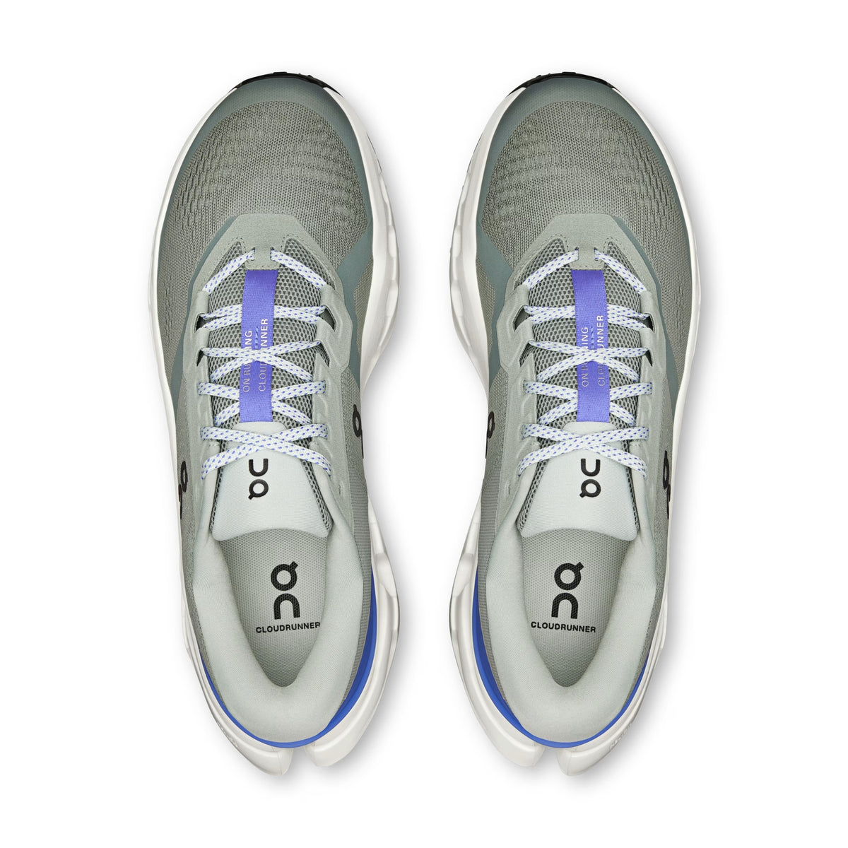 A pair of On running shoes shown from a top-down view, featuring a light gray and white mesh upper with a distinctive purple accent on the laces and a blue accent on the heel.