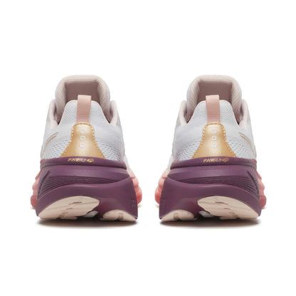 Pair of running shoes with a focus on the sole design on a white background