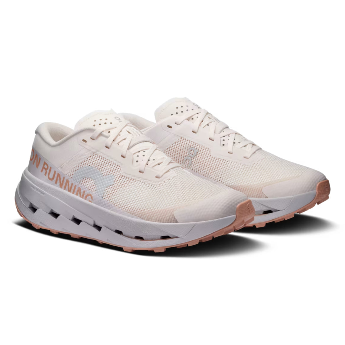 A pair of On running shoes in off-white mesh with a light gray logo on the side and a dusty rose outsole, shown against a plain white background.