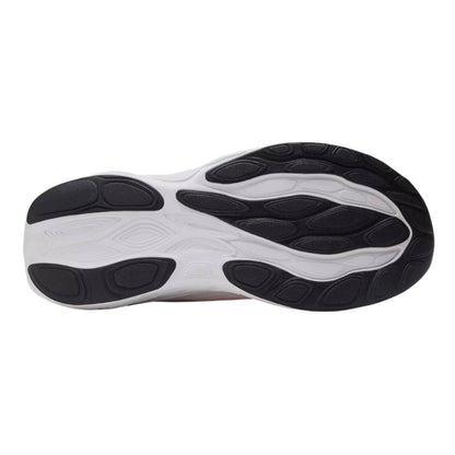 Close-up of a shoe sole with black and white design on a white background