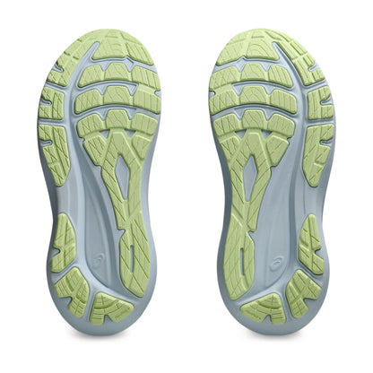 Close-up of a shoe sole with green and gray pattern on a white background