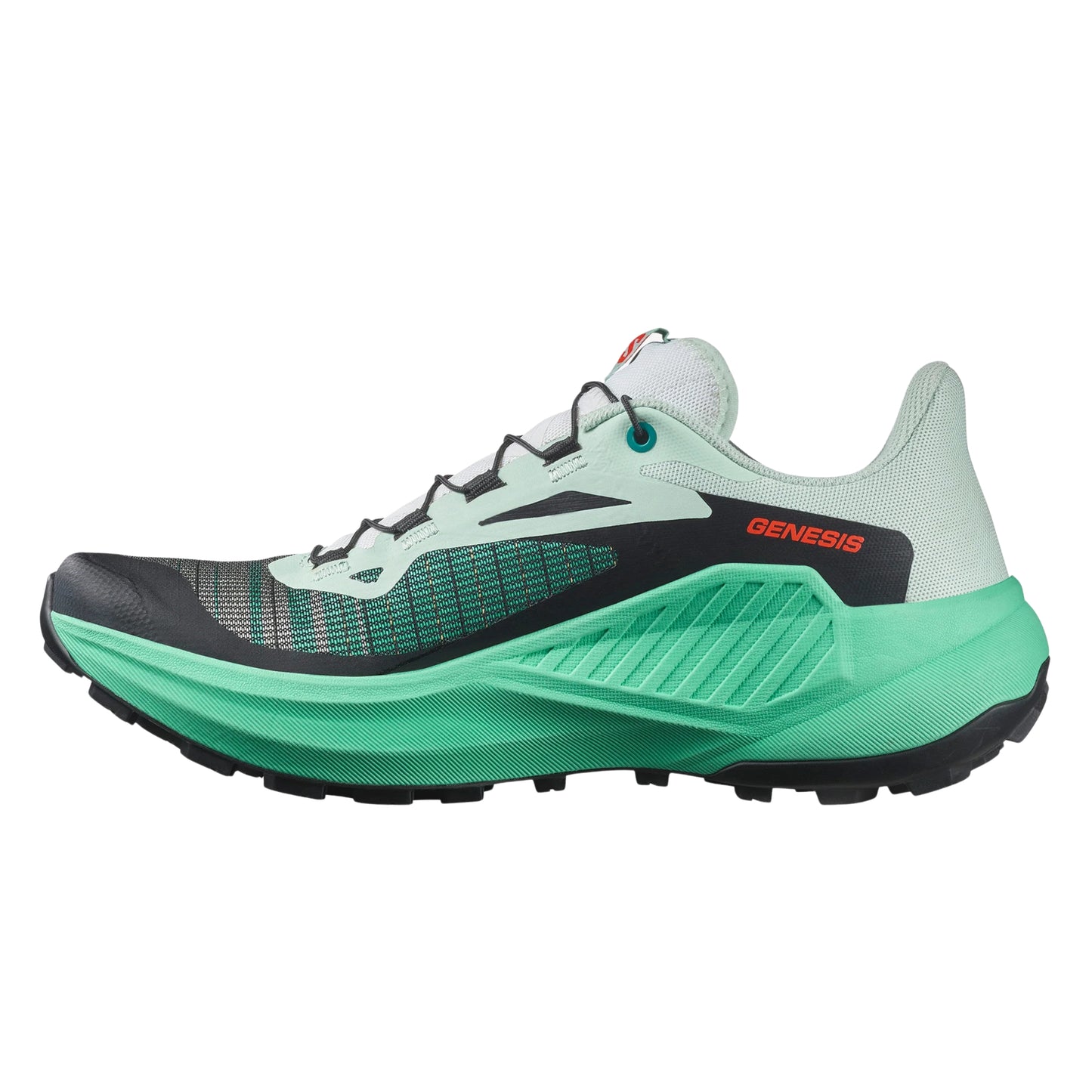 Green running shoe with black sole on a white background