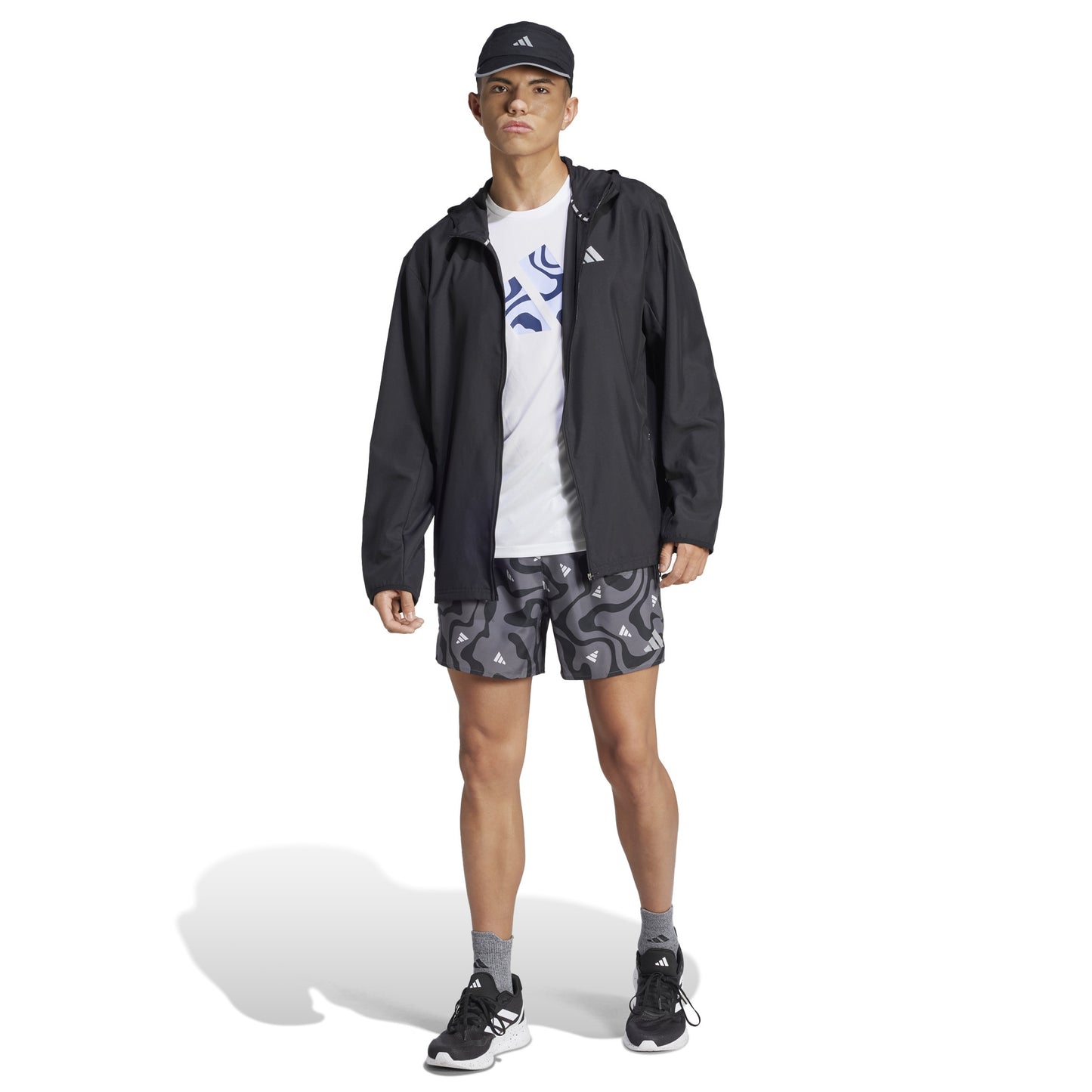 Man wearing Adidas grey patterned short 