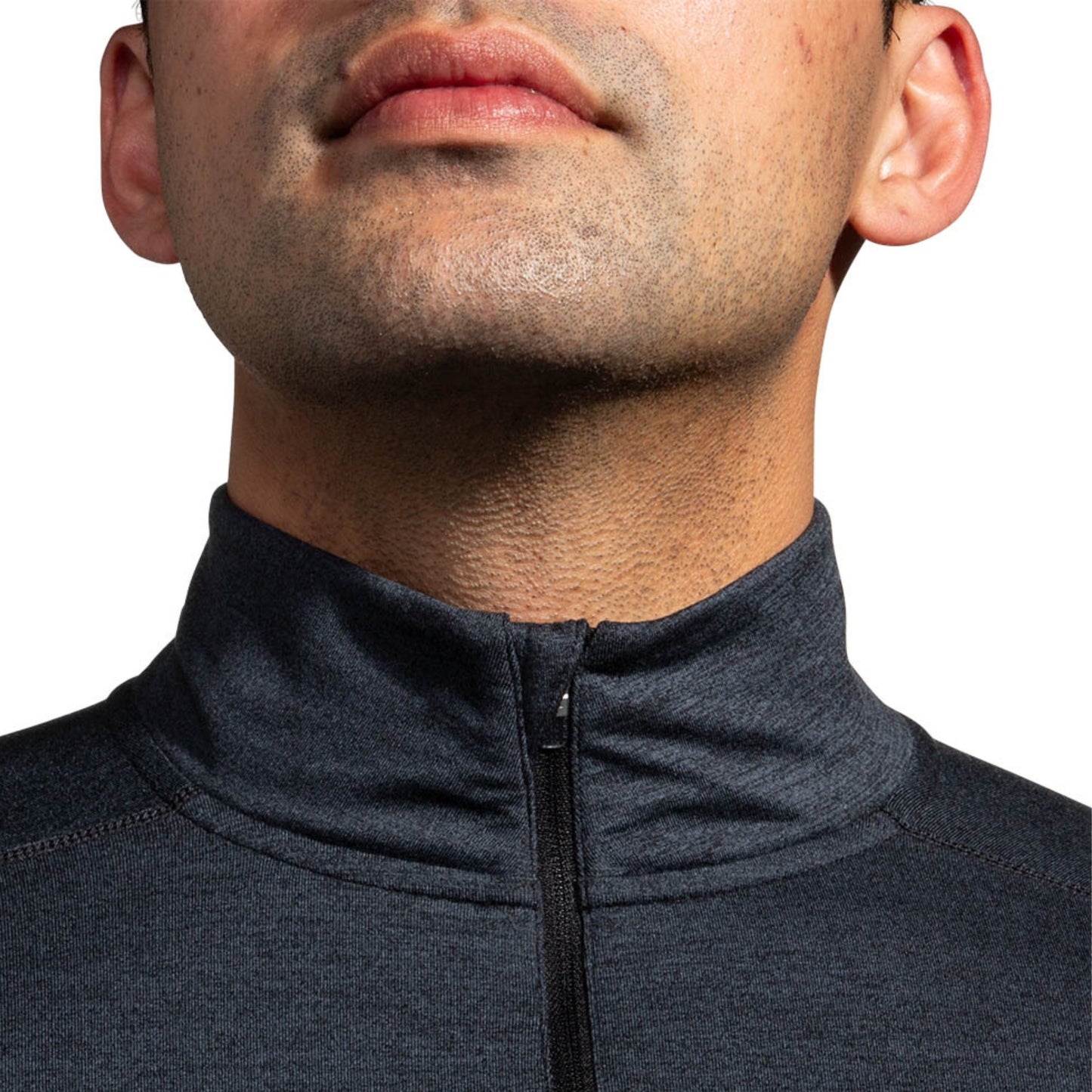 Close-up of a man wearing a long sleeve jersey on a white background