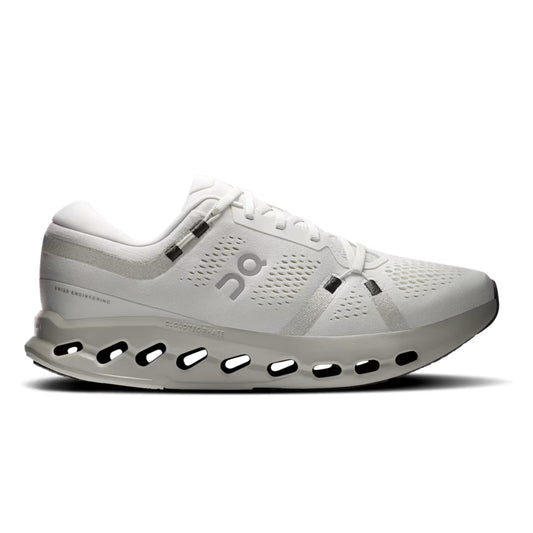 A white On running shoe with gray accents and a distinctive hollowed-out sole, shown in a side profile on a white background.