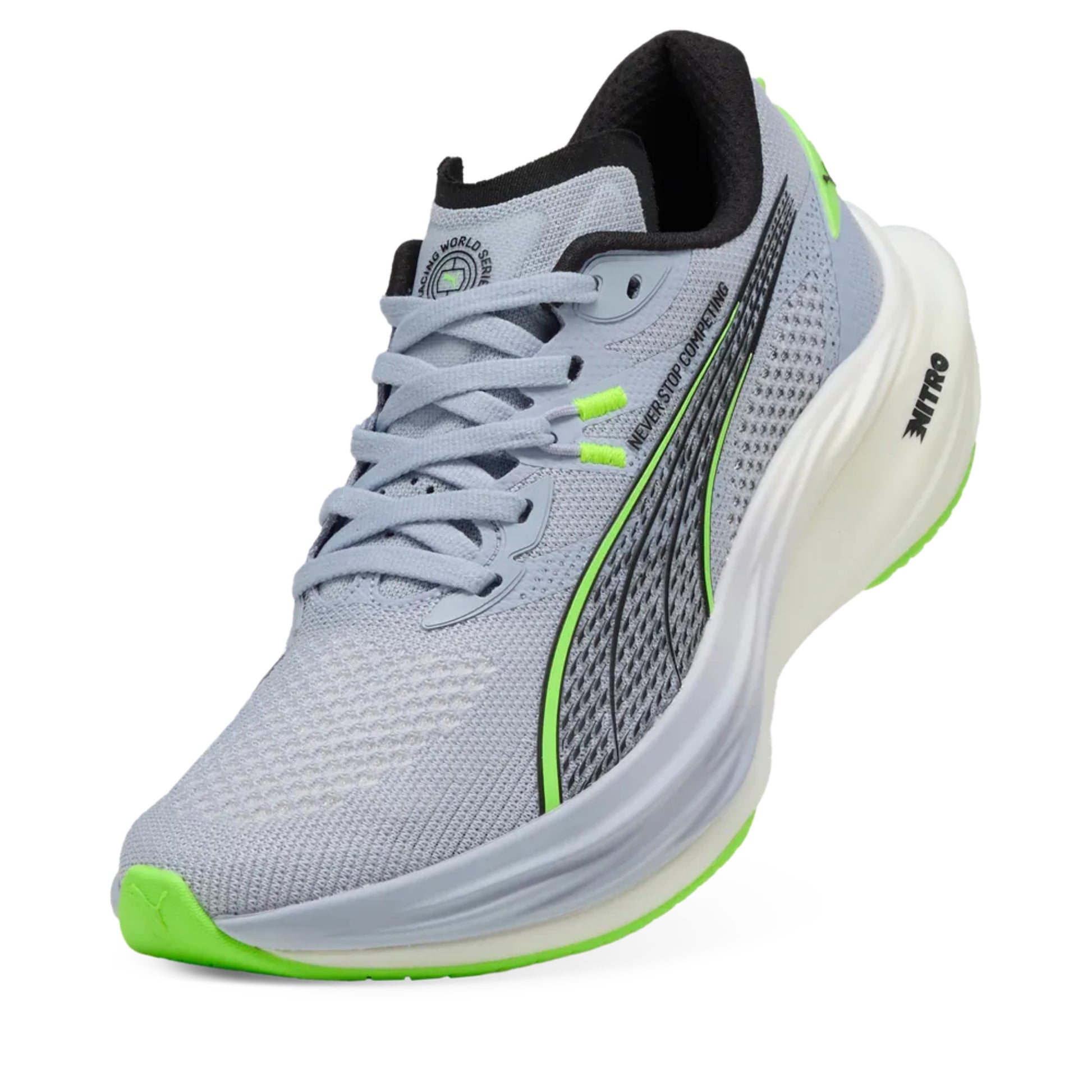 Gray Puma running shoe with green accents on a white background