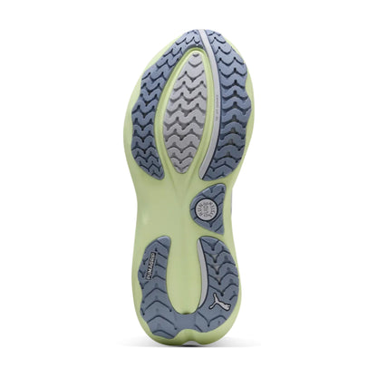 Close-up of a gray Puma shoe sole with tread pattern on a white background