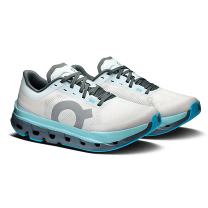 White and blue running shoe with gray accents on a white background