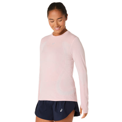 Woman wearing a light pink shirt on a white background