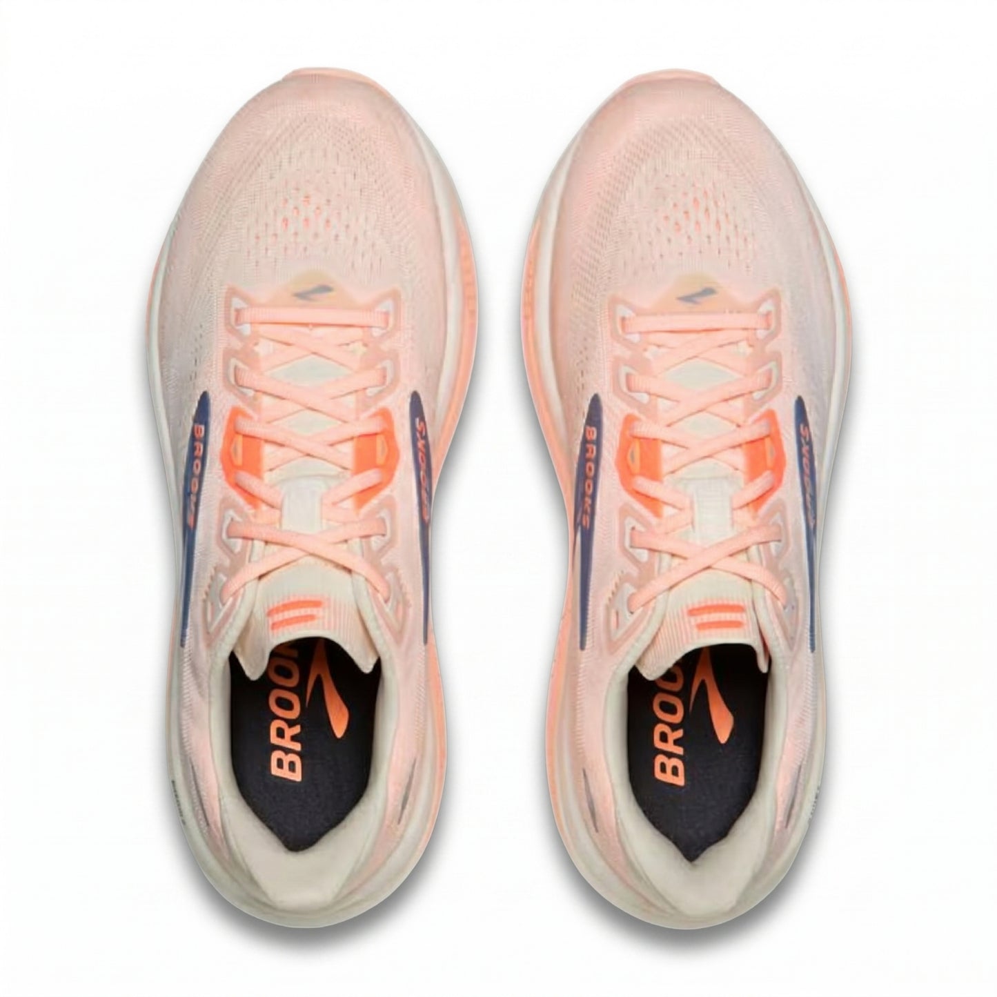 Pair of pink Brooks running shoes with orange accents on a white background