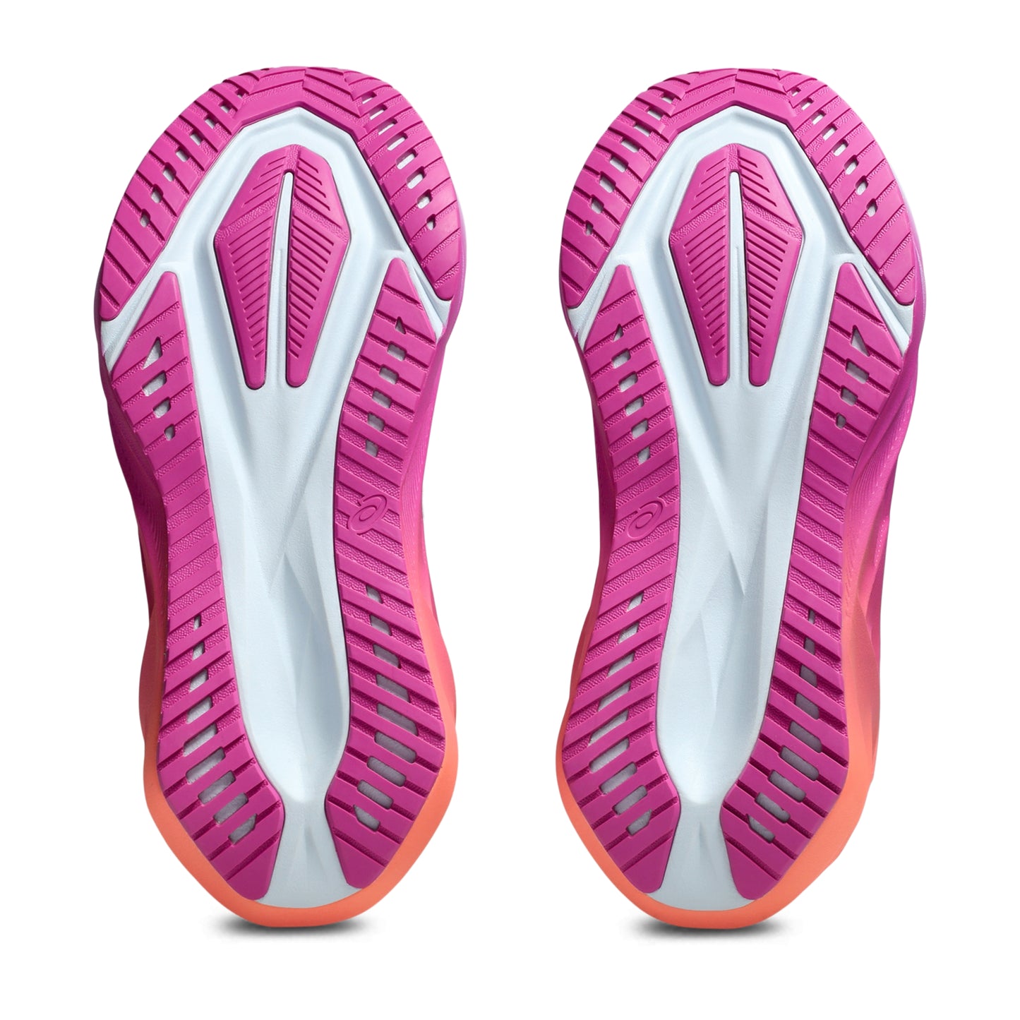 Bottom view pink shoe sole with tread pattern on a white background