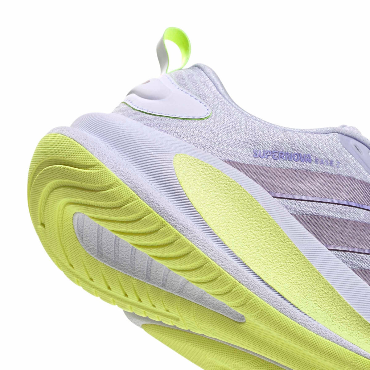 Close-up of a running shoe showing the heel and midsole, featuring a white and light purple upper with a bright neon yellow-green sole and pull tab, on a white background.