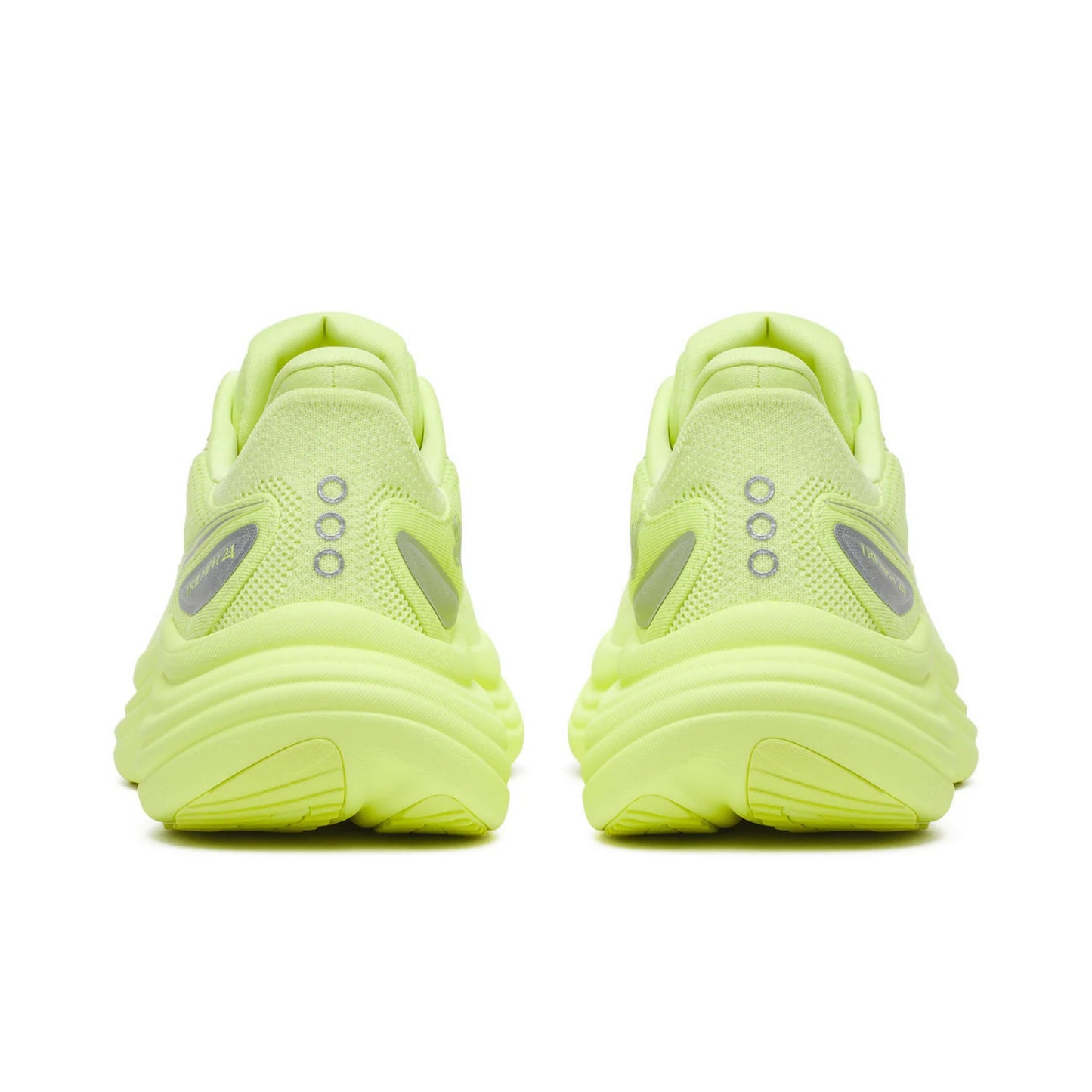 Pair of neon green Saucony running shoes on a white background