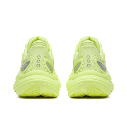 Pair of neon green Saucony running shoes on a white background