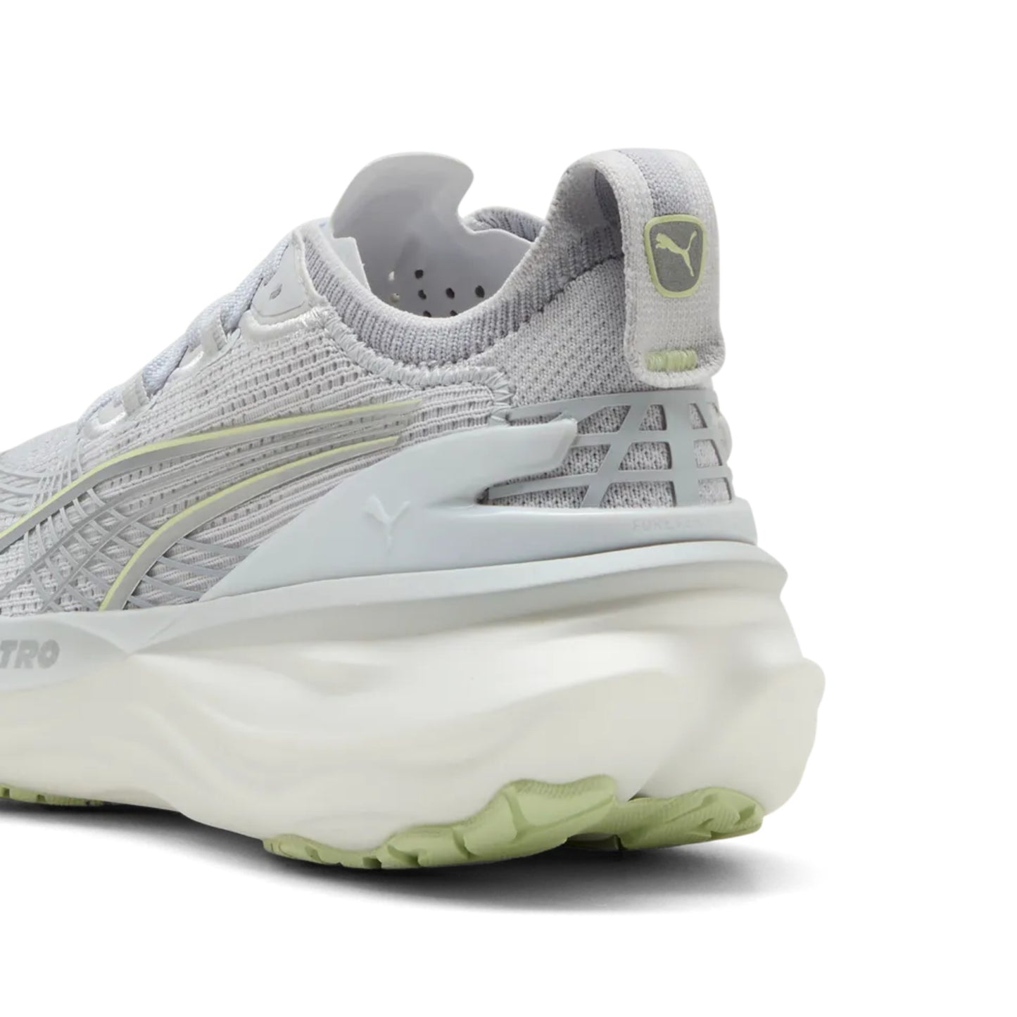 Light Gray Puma running shoe with white sole on a white background