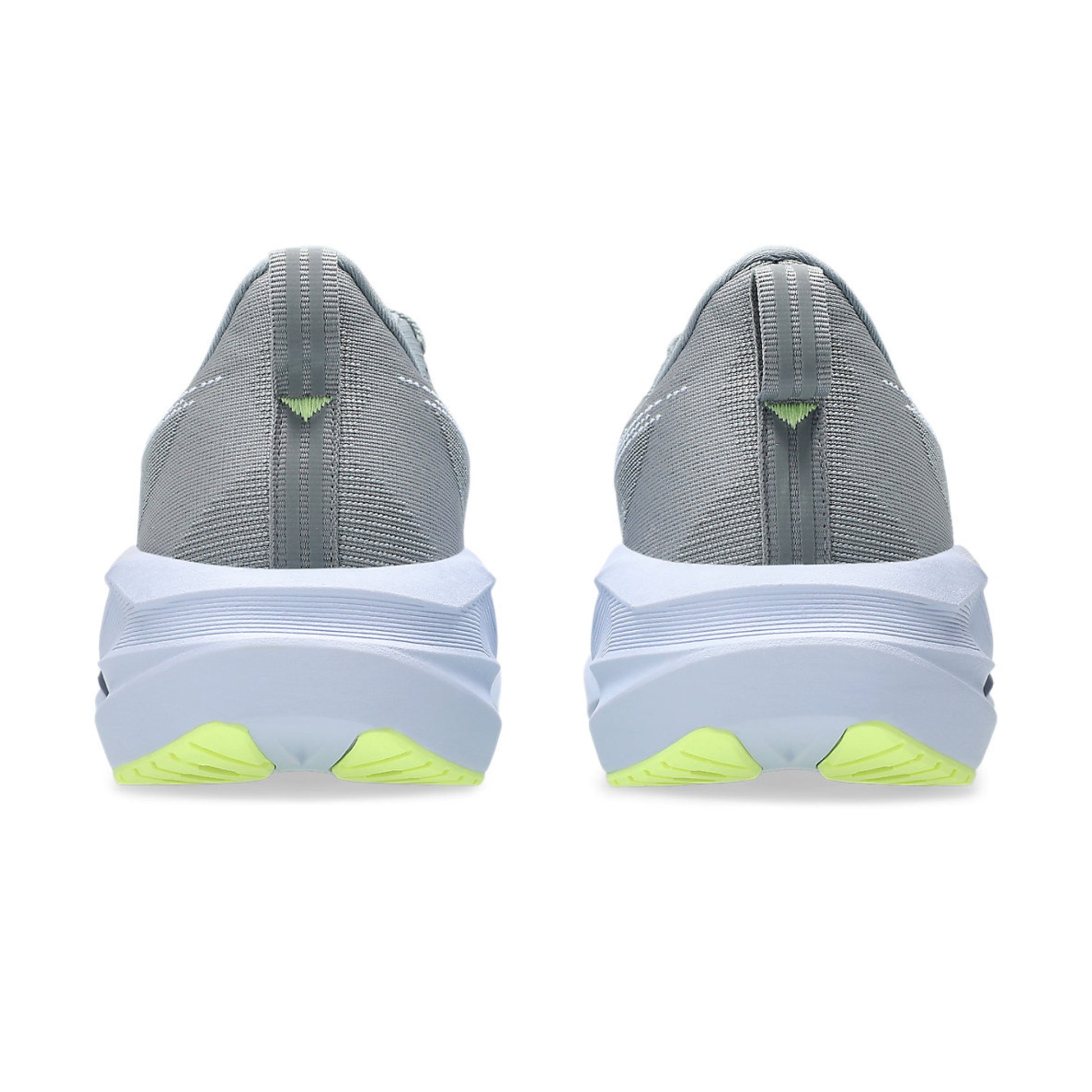 Gray running shoes with white soles and green accents on a white background