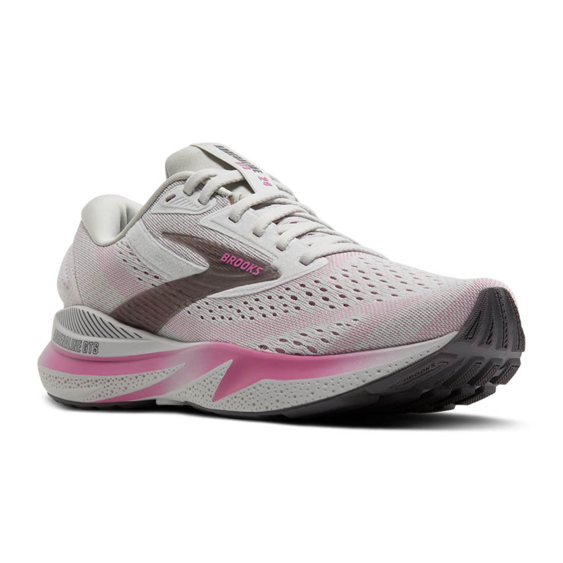 White and pink running shoe with 'Brooks' branding on a white background