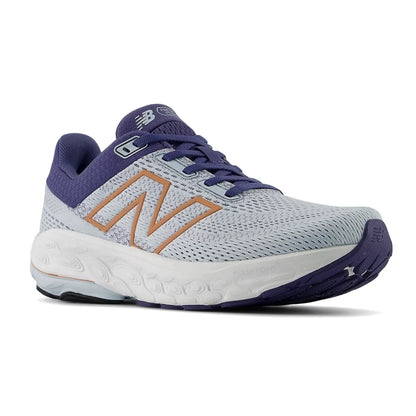 Light blue and purple running shoe with New Balance logo on a white background