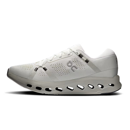 A white On running shoe with gray accents and a distinctive hollowed-out sole, shown in a side profile on a white background.
