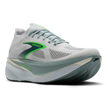 White Brooks running shoe with green accents on a white background