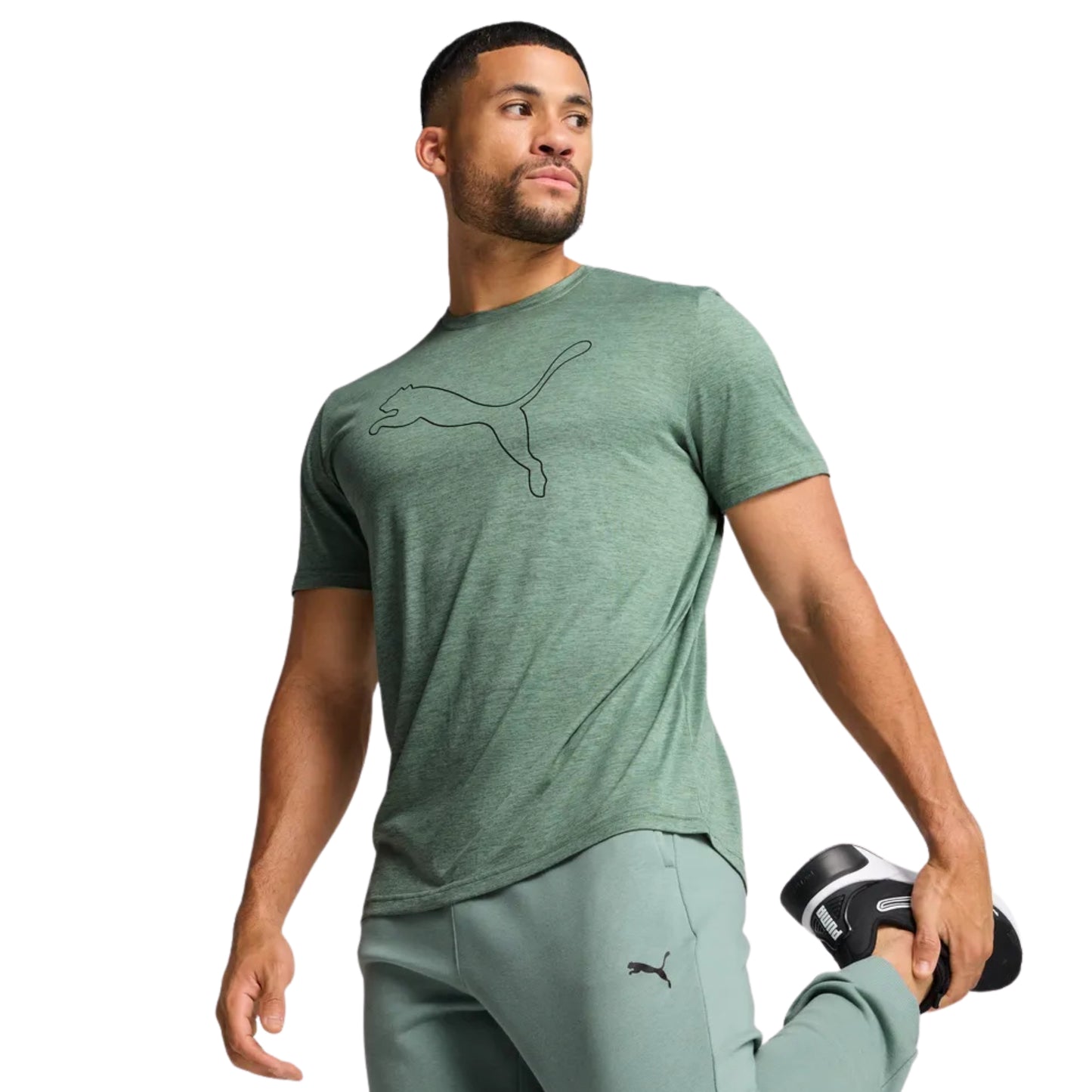 Man wearing a green Puma shirt 