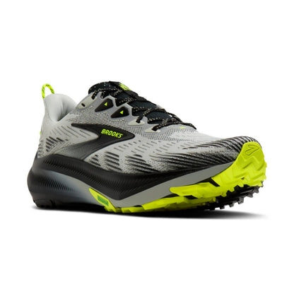 Gray and black Brooks running shoe with yellow sole on a white background