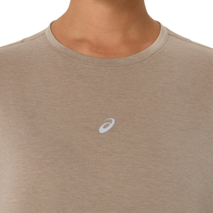 Close-up of a person wearing a heather taupe athletic t-shirt with a small white Asics logo on the chest, set against a plain white background.