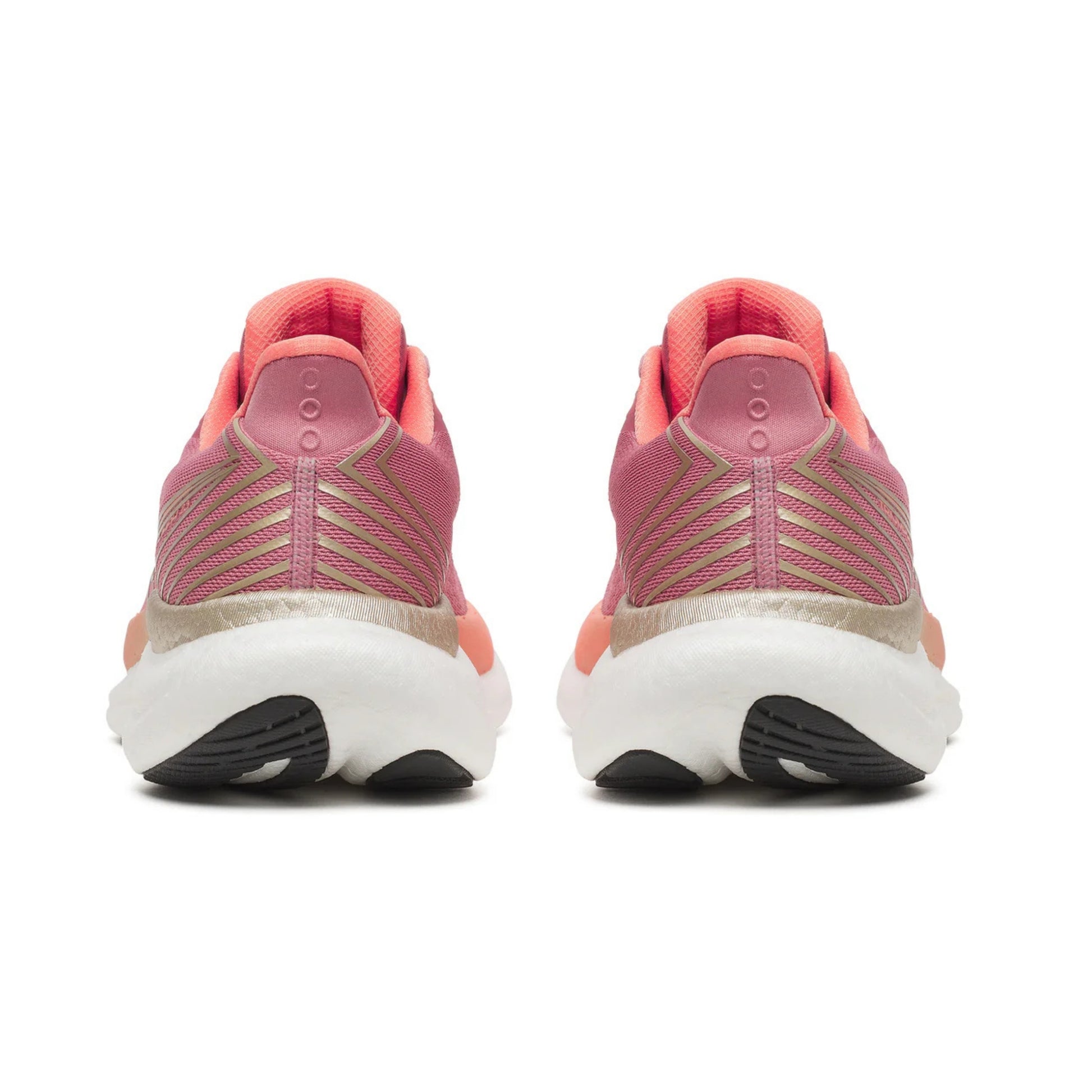 Pink Saucony running shoes with a white sole on a white background