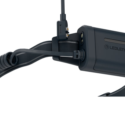 Black LED lenser device on a white background
