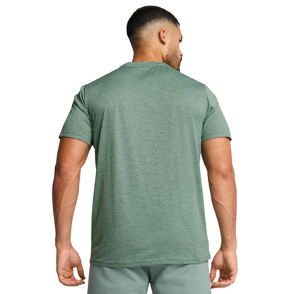 Man wearing a green shirt 