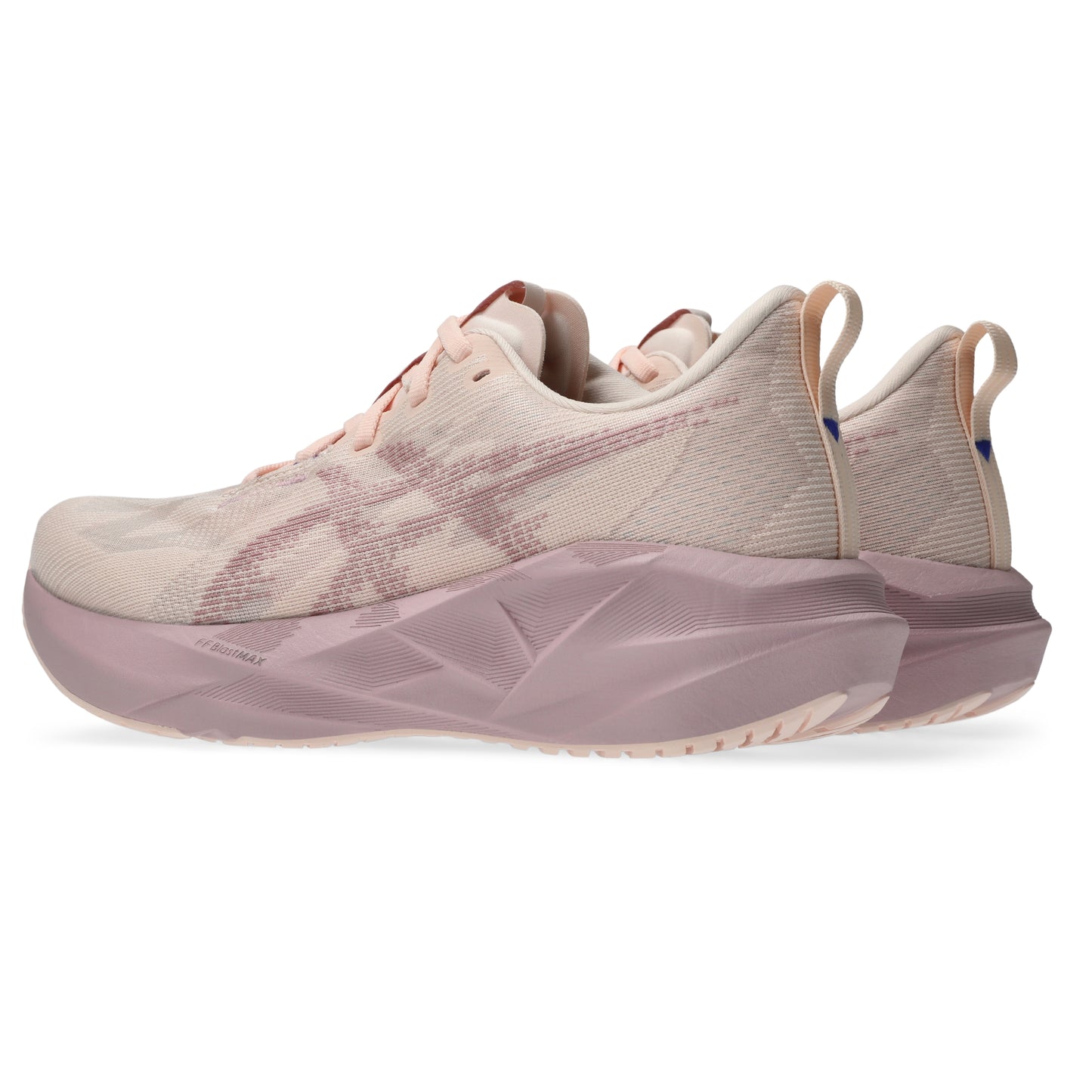 Pink Asics running shoes on a white background
