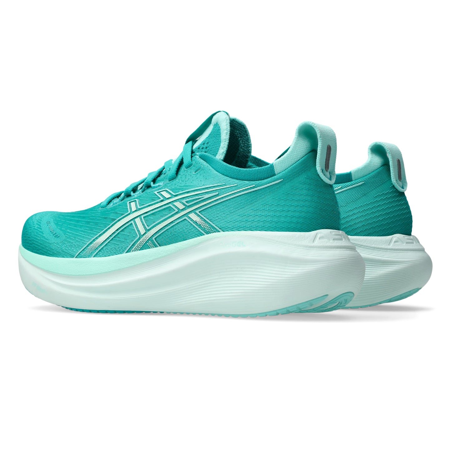 Teal running shoe with white sole on a white background