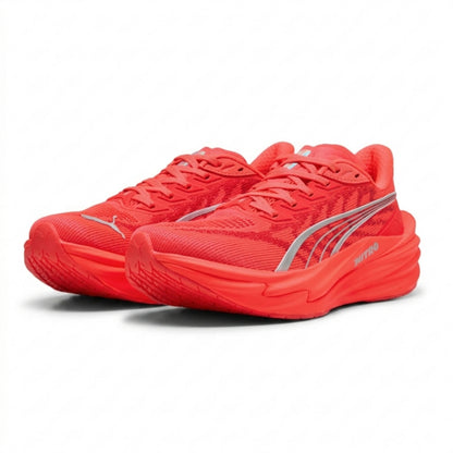 Red Puma running shoes with a silver logo on a white background