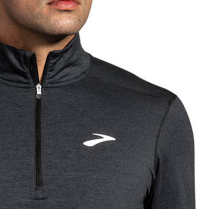 Close-up of a man wearing a long sleeve jersey on a white background