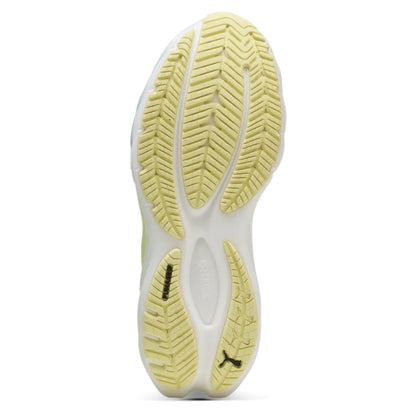 Close-up of a yellow shoe sole with a brand logo on a white background