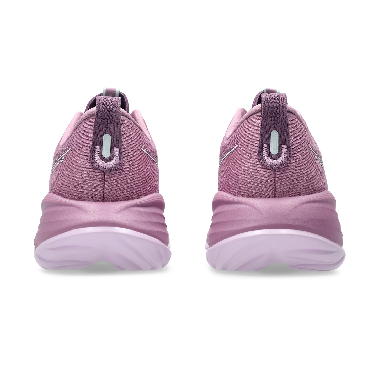 Pair of pink Asics running shoes on a white background
