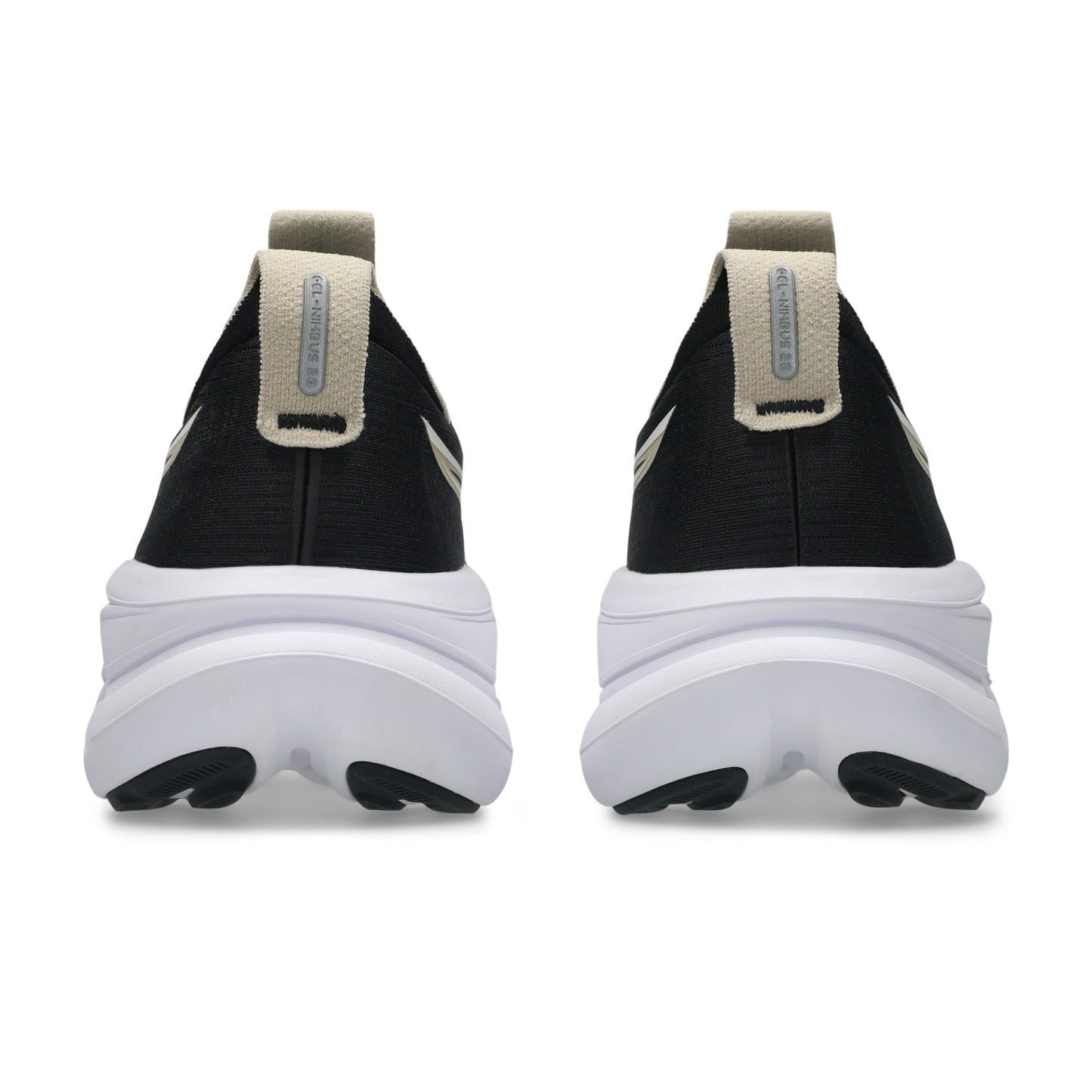 Black and white Asics running with a thick white sole on a white background
