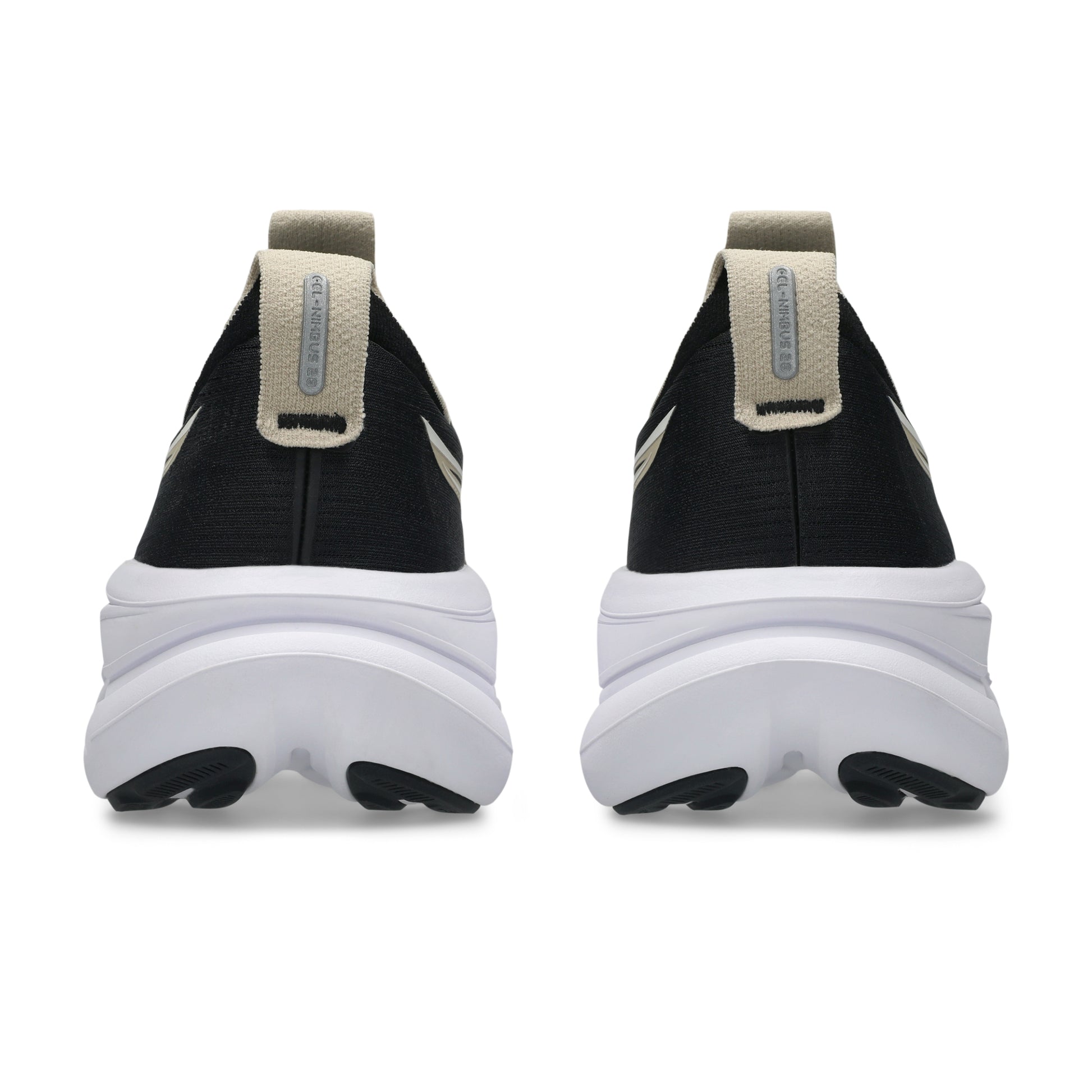 Black and white Asics running with a thick white sole on a white background