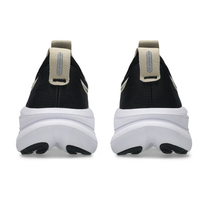 Black and white Asics running with a thick white sole on a white background