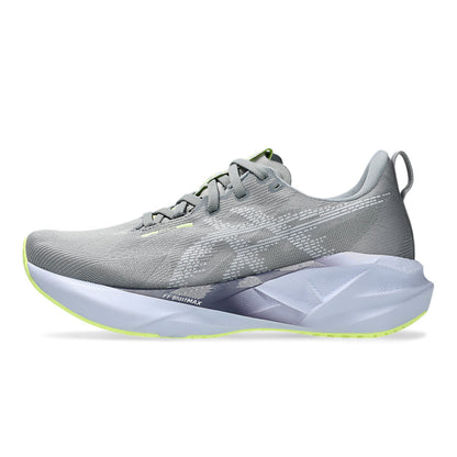 Gray running shoe with a white sole on a white background