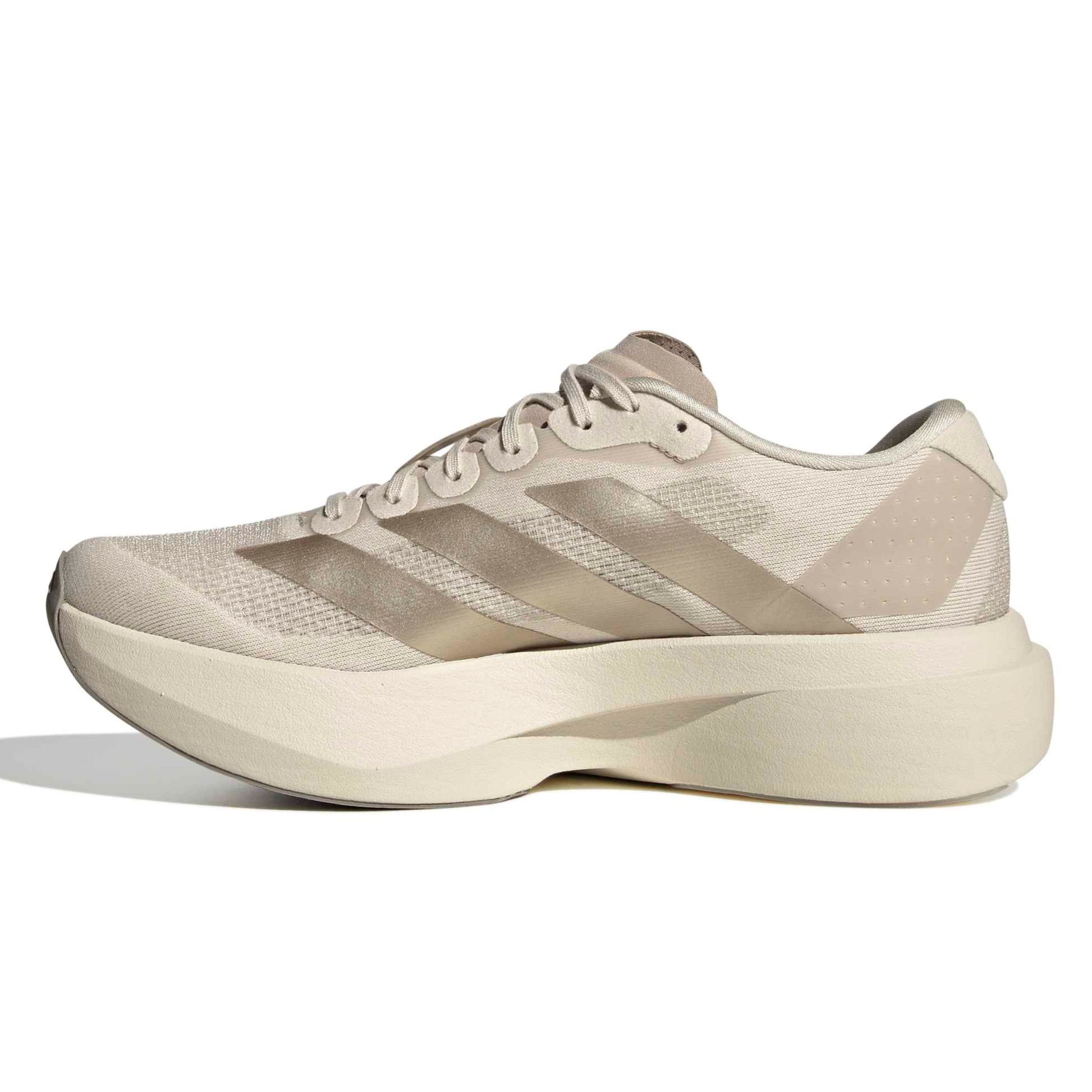 Beige Adidas running shoe on a white background