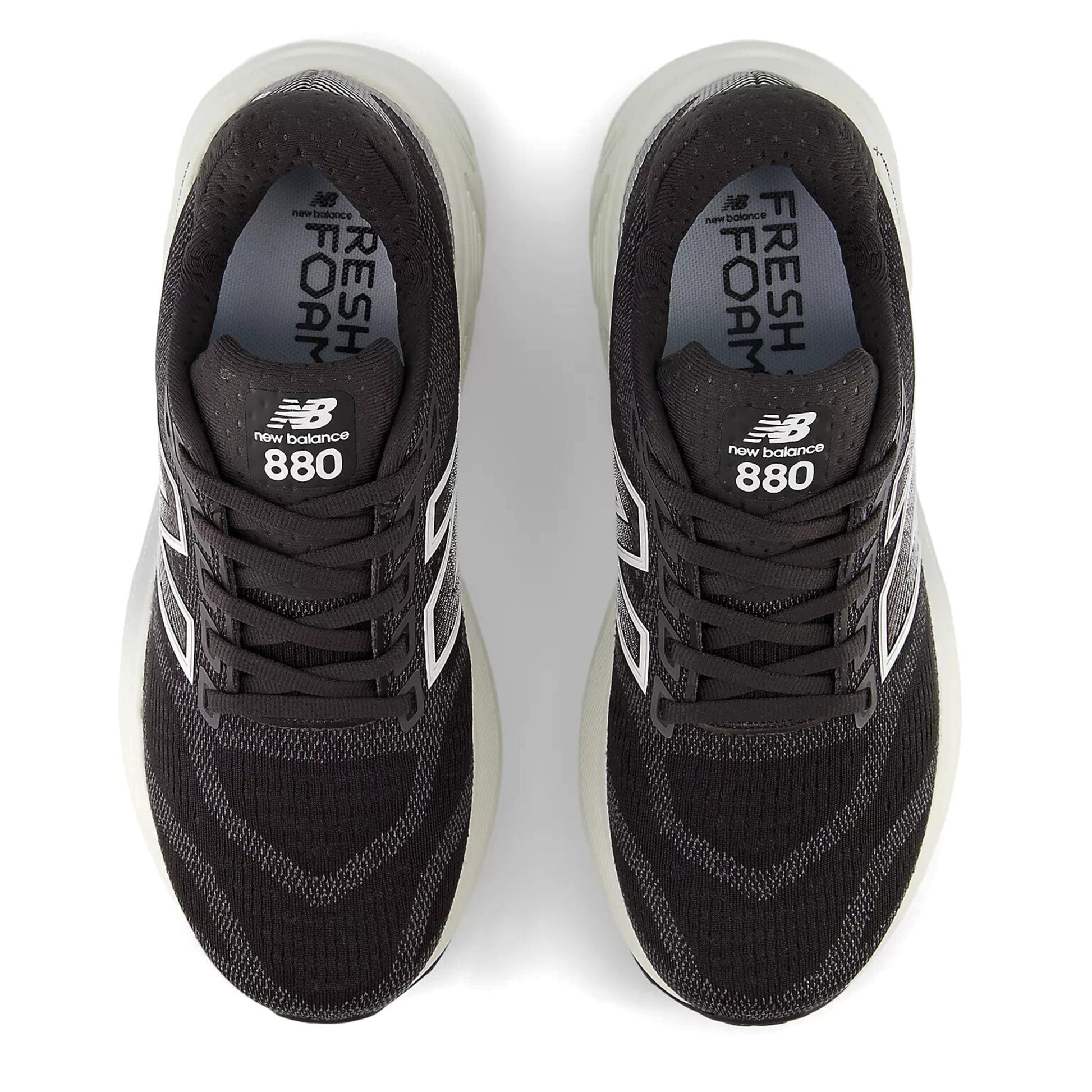 Black New Balance 880 sneakers on a white background