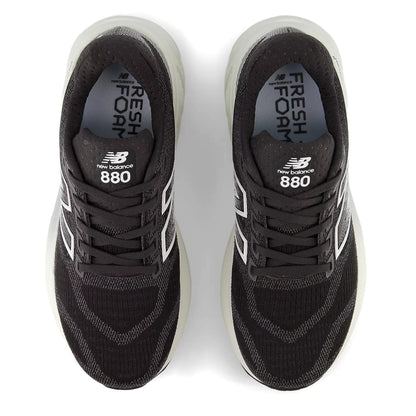 Black New Balance 880 sneakers on a white background