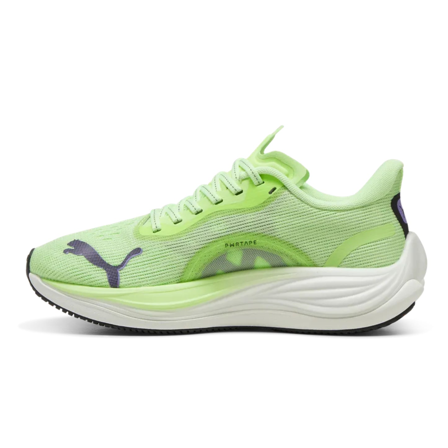 Bright green Puma running shoe with white sole on a white background