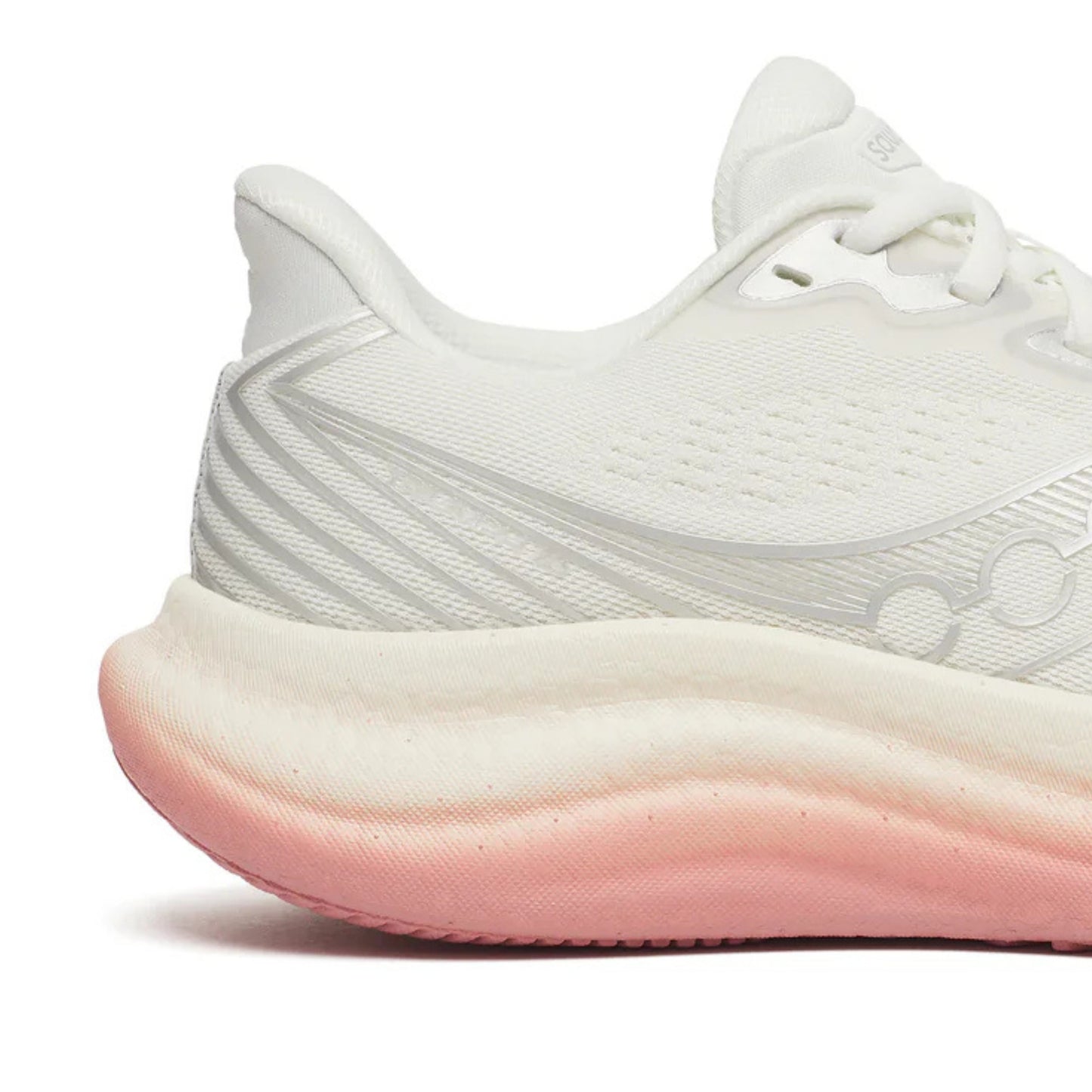 White Saucony running shoe with pink sole on a white background