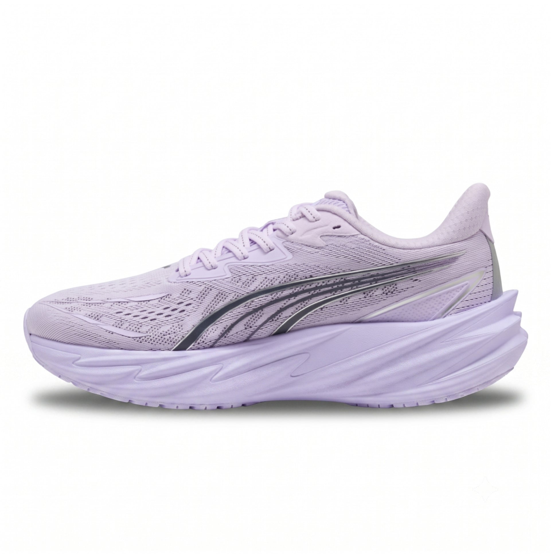A light purple Puma running shoe with a thick, sculpted matching sole and a dark gray side stripe, shown from the side on a white background.