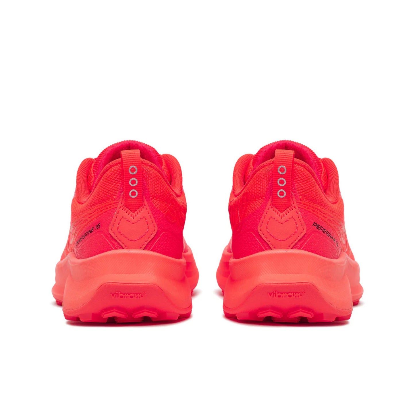 Pair of red Saucony running shoes on a white background